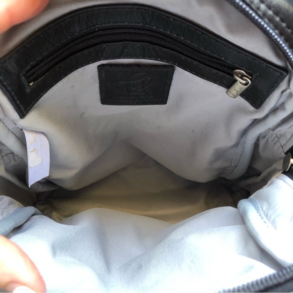 Piel black leather drawstring and flap backpack strap zips to one strap or two - Picture 3 of 11